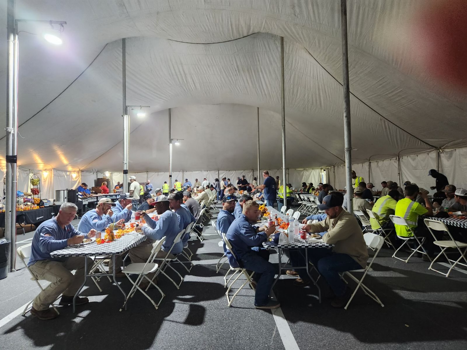 After a full day in the field,
workers eat a meal at SVEC’s
storm base camp.